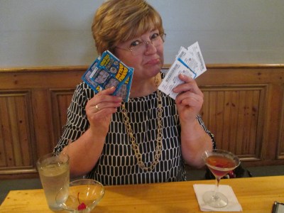 25 lotto tickets: $50. Post Scratch-Off Carpal Tunnel Meds: $80. Winnings: $4. That face: Priceless.
