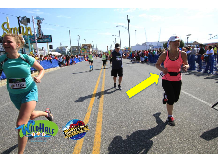 The official finish line photo. I think I was disqualified for the rebellious-yet-jaunty placement of my race number.
