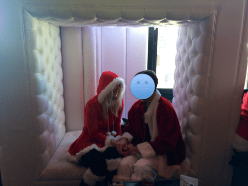 A stranger insisted on taking this photo during Santacon 2014.